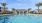 a pool with a building in the background
